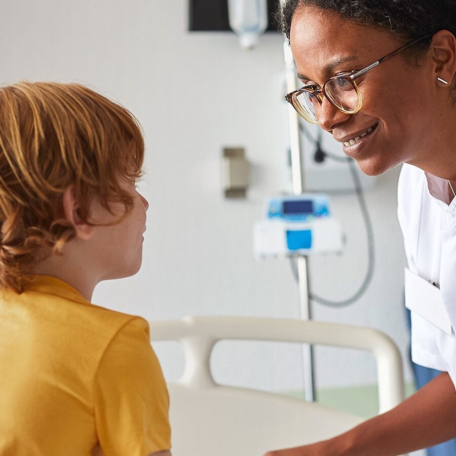 child with autism being seen by a doctor