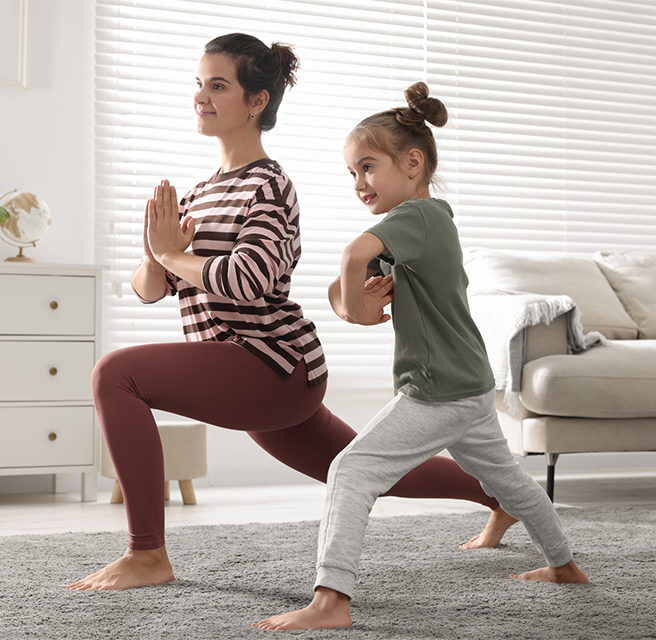 mom and child doing yoga
