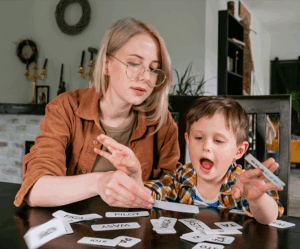 Mom with kid and flash cards