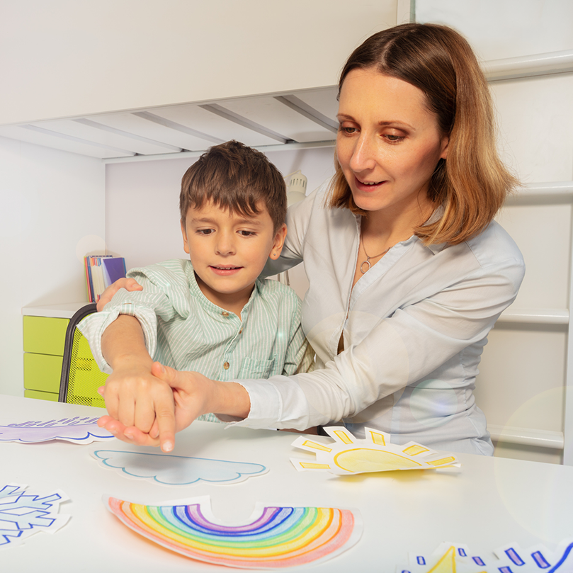 Child and therapist doing ABA therapy